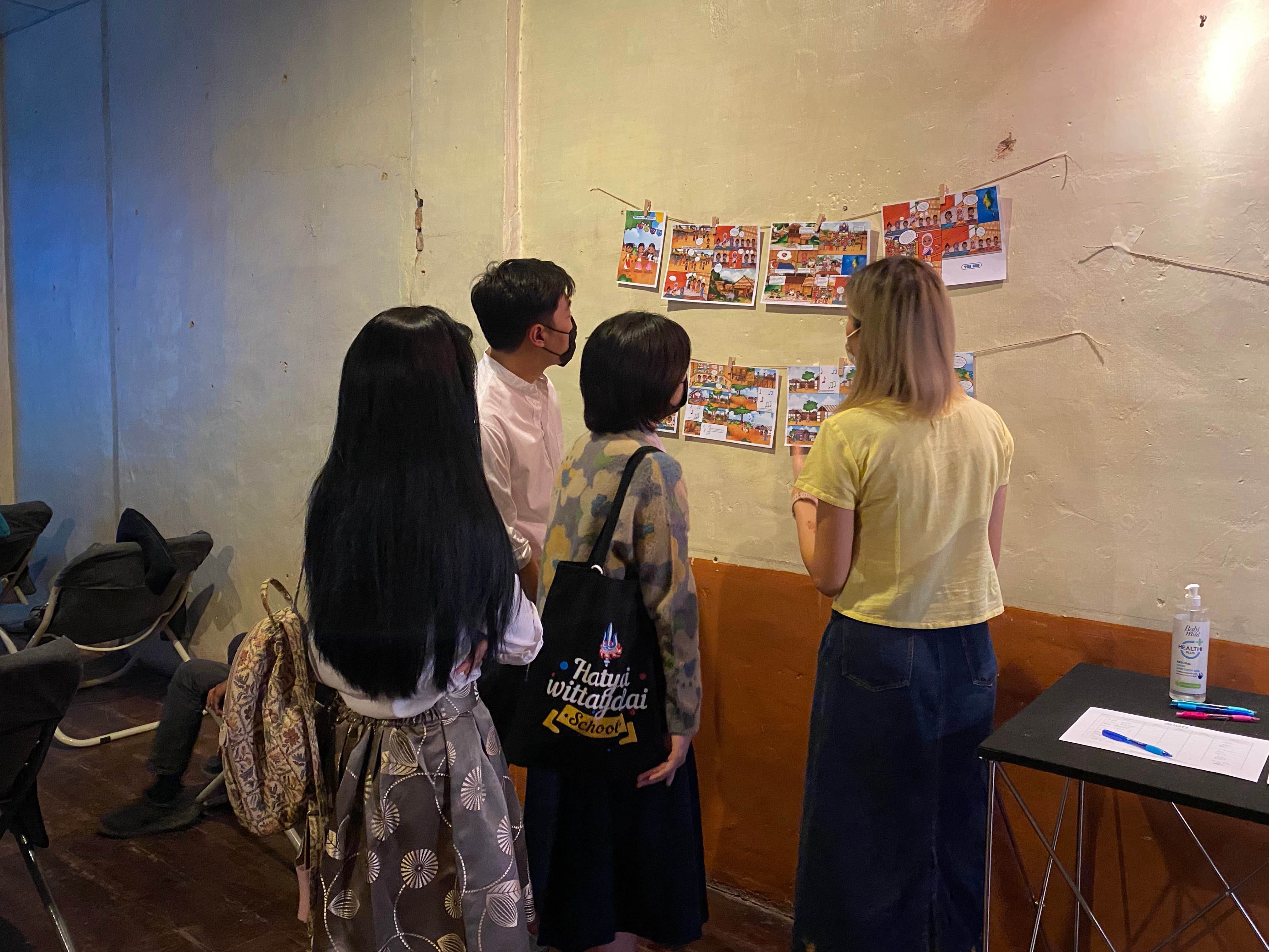 Attendees going through the exhibited Rohingya cultural heritage during Film Launch in Hat Yai, Songkhla.